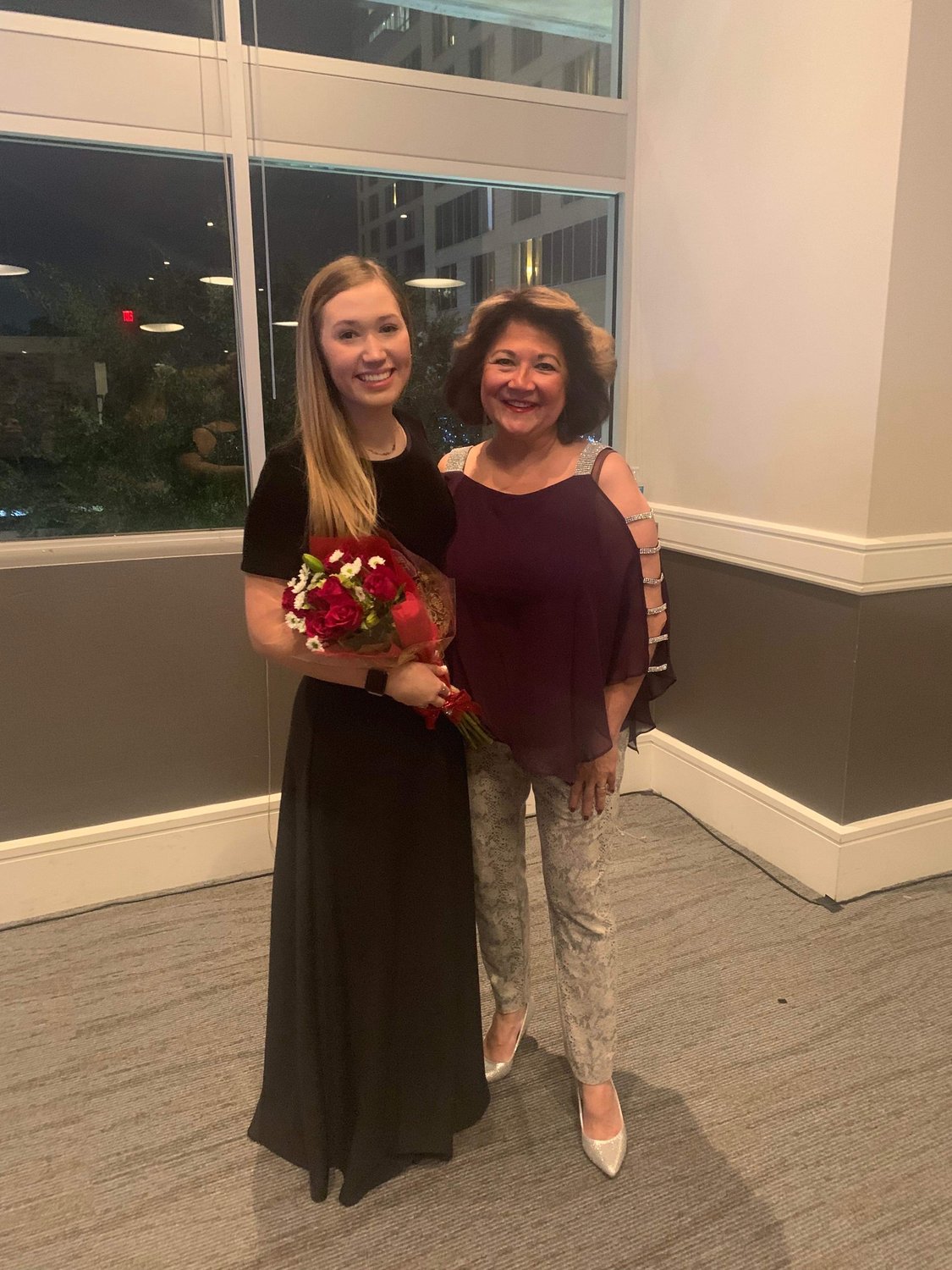 Winkie Ballas Jamail, right, artistic director for the New Katy Town Theatre, poses with Catherine Piskurich, one of her students.